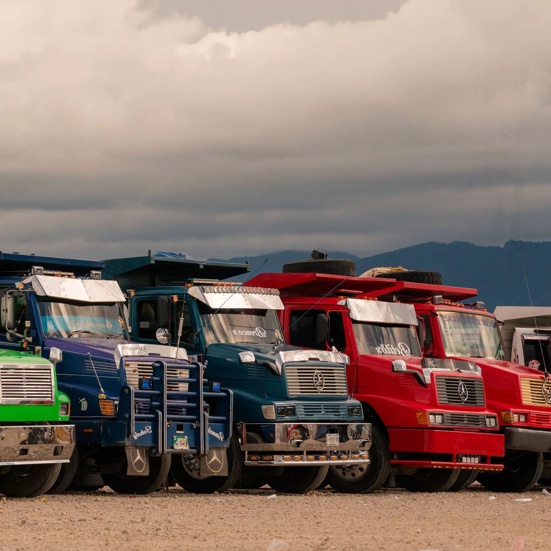 Row of parked heavy-duty trucks
